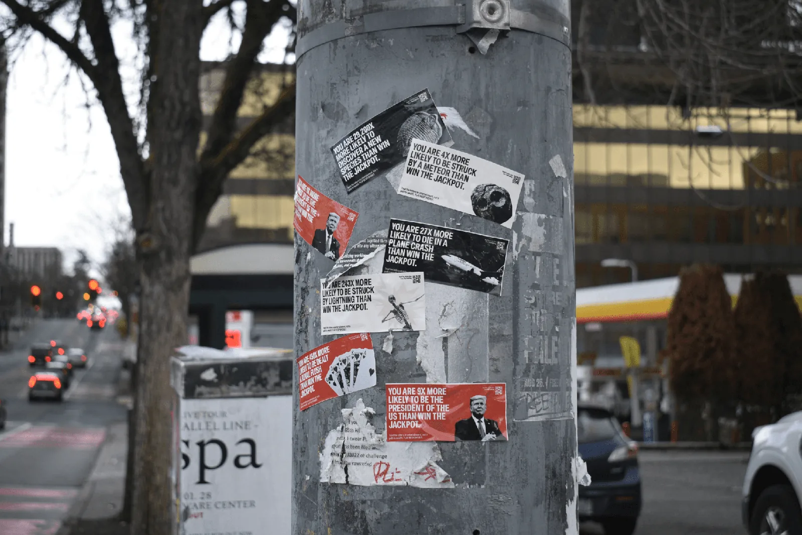 Lottery stickers posted on a street pole