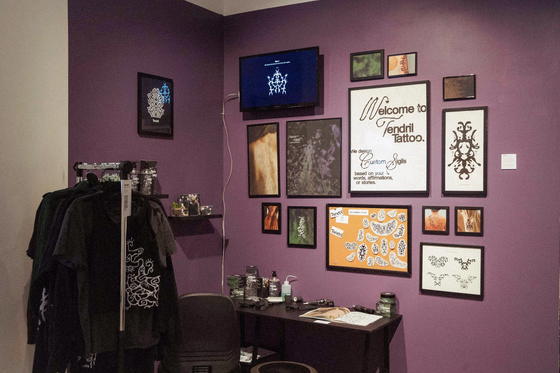 Tendril Tattoo product collection on purple background